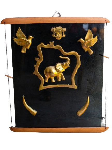 Tableau artisanal vitré avec la carte de la Côte d'Ivoire et un éléphant