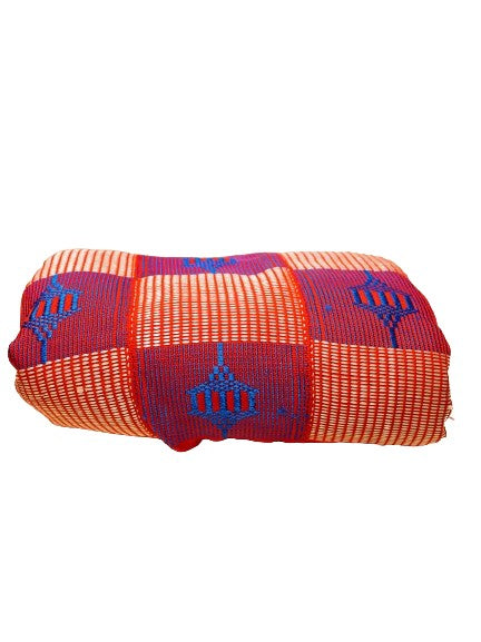 Pagne kita orange, rouge et bleu.