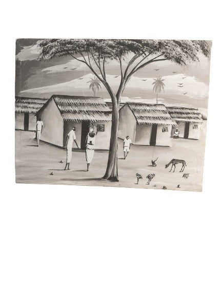 Tableau artisanal montrant un village